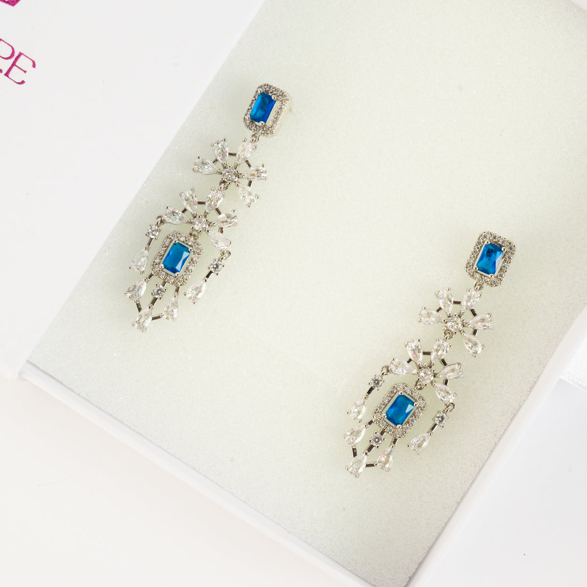 Sparkling Brass & Zircon Drop Earrings with Blue Accents