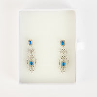 Sparkling Brass & Zircon Drop Earrings with Blue Accents