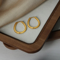 Golden Aura Hoop Earrings by Signature Jewelry