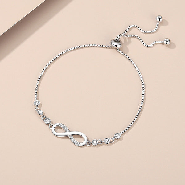 سوار إنفينيتي الفضي المميز - فضة عيار 925 مع لمسات من الكريستال من Signature Jewelry 