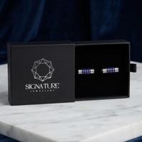 أزرار أكمام أسطوانية فضية وزرقاء من Signature Jewelry
