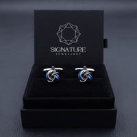 أزرار أكمام العقدة باللونين الأزرق والأسود من Signature Jewelry   